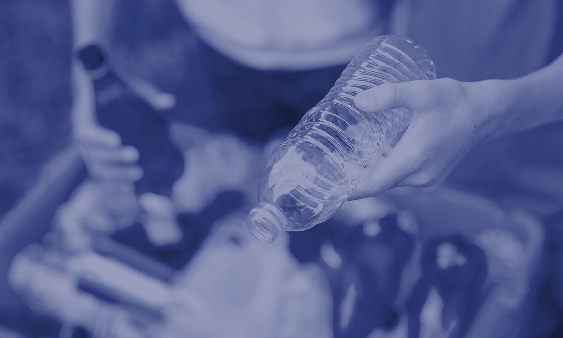 Person holding bottle
